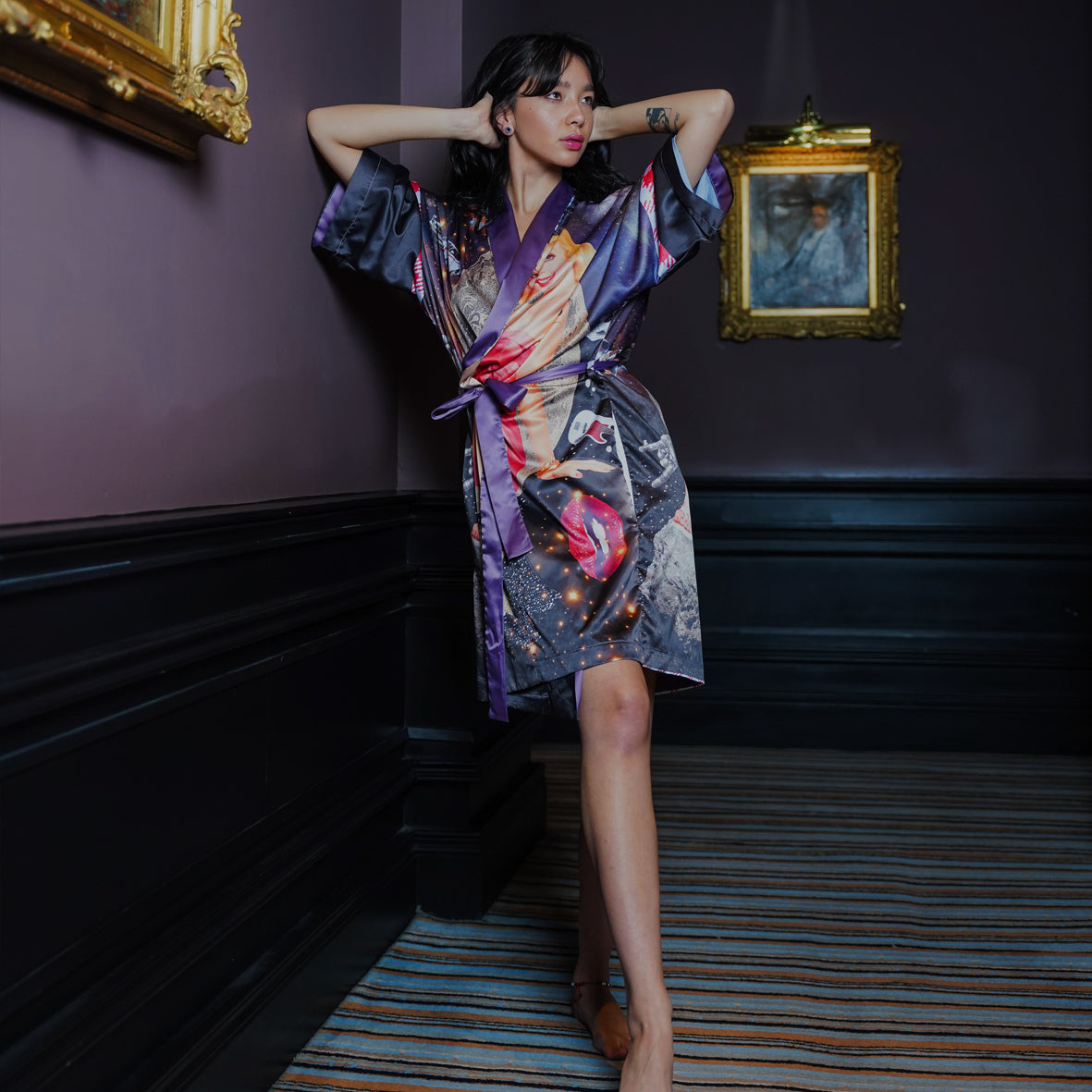 A Model in a Hotel wearing a luxury 100% silk kimono in a maximalist retro Pin Up design