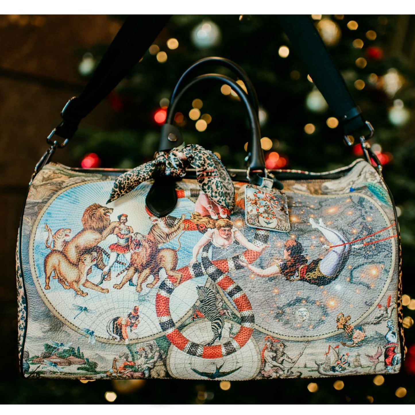 Le Cirque Du Monde Weekender Leather Duffle Bag