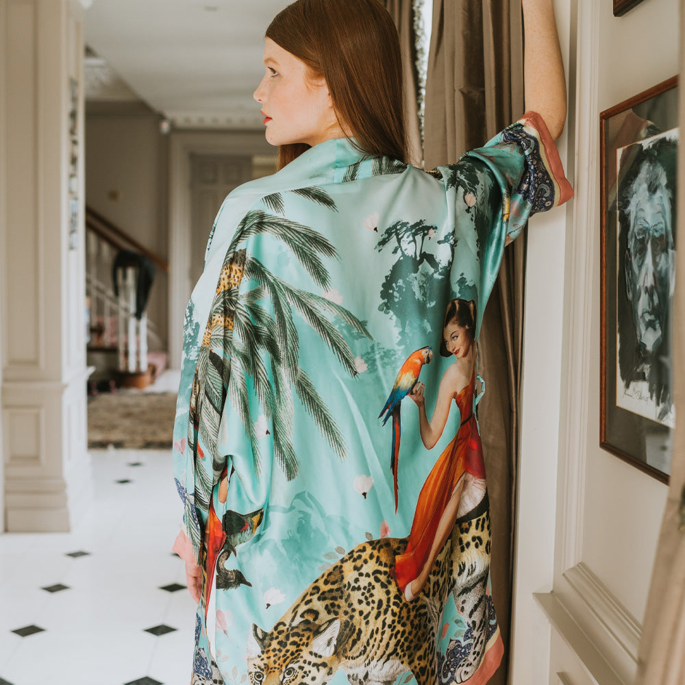 Female model showing back view of luxury 100% silk Kimono in a maximalist vintage turquoise design