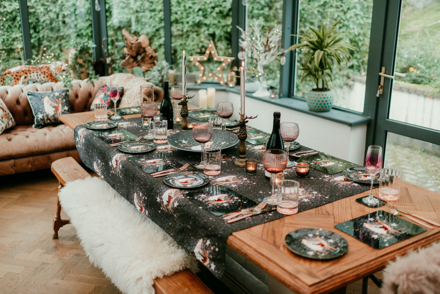 A dining table featured in a festive maximalist design called - festive celeste