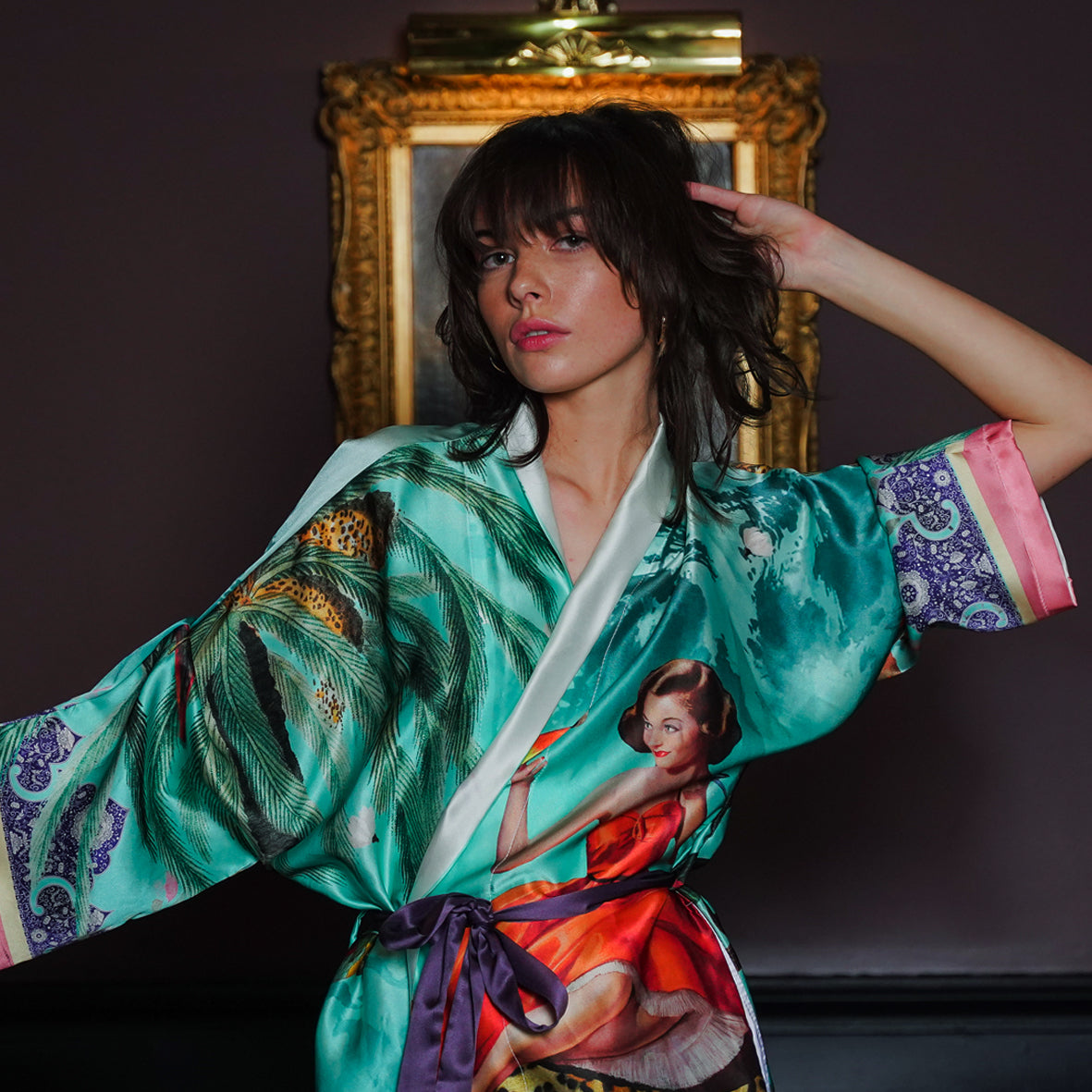 Female Model wearing luxury 100% silk Kimono in a maximalist vintage turquoise design 